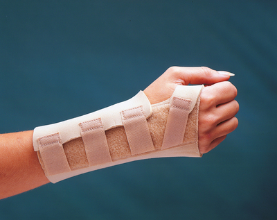 Right hand wrist brace laminated on both sides with a durable nylon incorporating shaped aluminium palmar bar. Beige x1